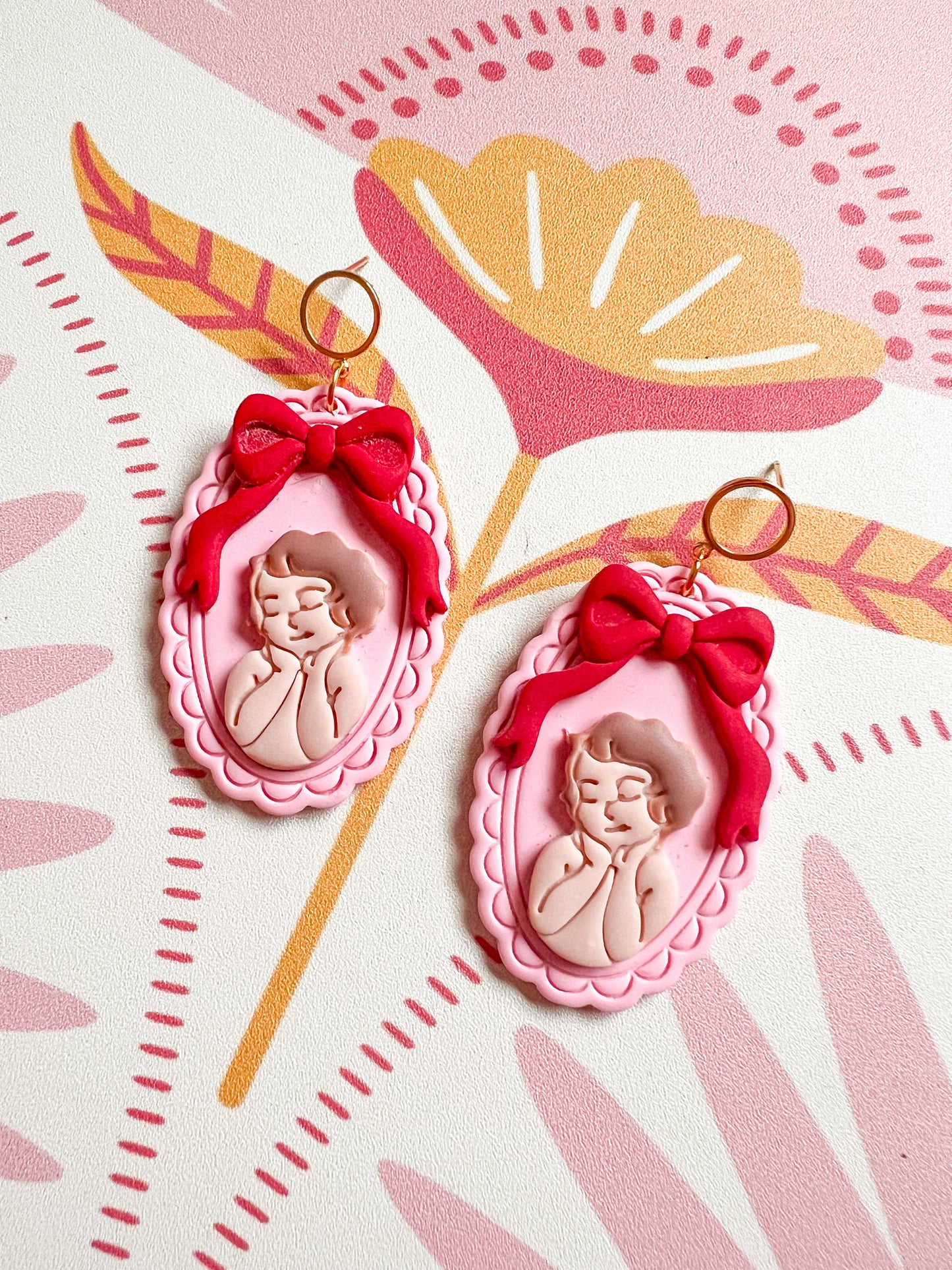 Framed Cherub Dangles