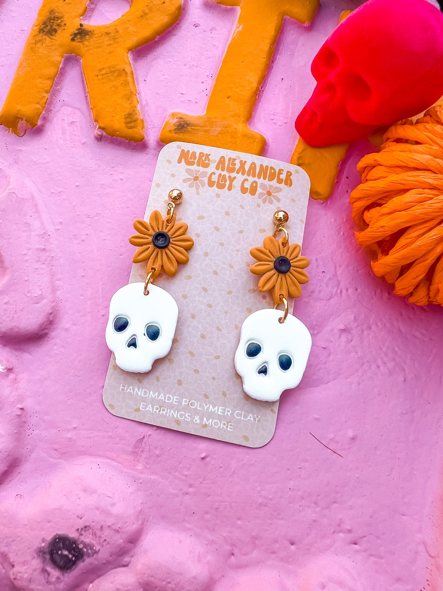 Daisy Skull Dangles