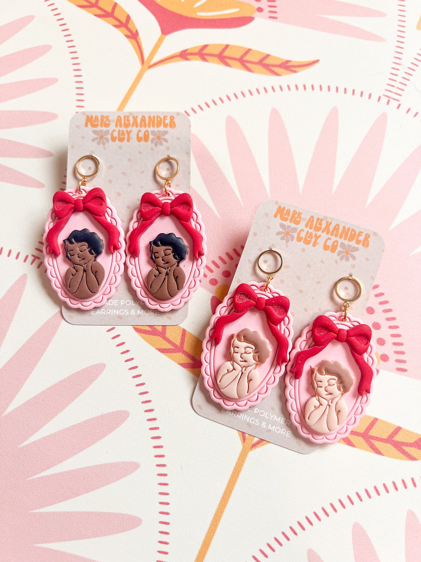 Framed Cherub Dangles